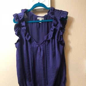 Purple sleeveless ruffled blouse